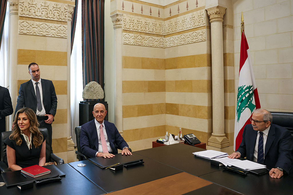 Lebanon's Prime Minister Nawaf Salam (R) holds a meeting with US ambassador to Turkey and special envoy for Syria Tom Barrack (C) and US deputy Middle East envoy Morgan Ortagus in Beirut on August 18, 2025. Barrack called on Israel to honour its commitments under a ceasefire that ended its war with Hezbollah, after the Lebanese government launched a process to disarm the militant group. (Photo by ANWAR AMRO / AFP) (Photo by ANWAR AMRO/AFP via Getty Images) - Morgan Ortagus Gallery Image