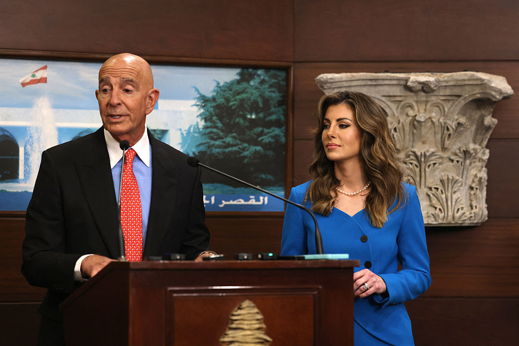 US ambassador to Turkey and special envoy for Syria Tom Barrack (L) delivers a statement, as he is accompanied by US deputy Middle East envoy Morgan Ortagus, following a meeting with Lebanon's president at the Presidential Palace in Baabda on August 26, 2025. (Photo by ANWAR AMRO / AFP) (Photo by ANWAR AMRO/AFP via Getty Images) - Morgan Ortagus Gallery Image